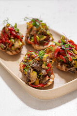 Mexican tacos with beef .