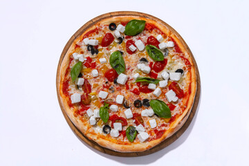 freshly baked pizza with feta cheese slicers on white background