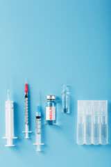 Medicine in ampoules with insulin, needles and syringes for medical subcutaneous injection