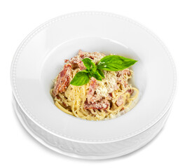 Close-up of tasty pasta with basil in white plate isolated on white background