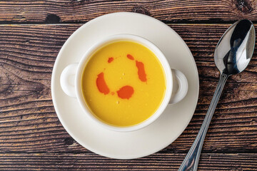 Strained lentil soup on a white porcelain plate