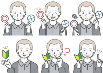 〇✕マークや初心者マークを持つ、高齢の白人男性