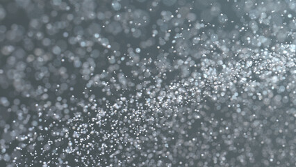 3D rendering of burst of crystal clear particles resembling splash of water droplets
