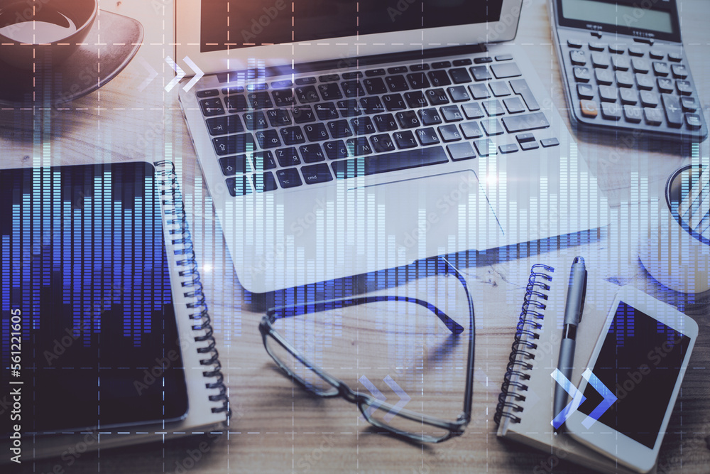 Poster financial market graph hologram and personal computer on background. double exposure. concept of for