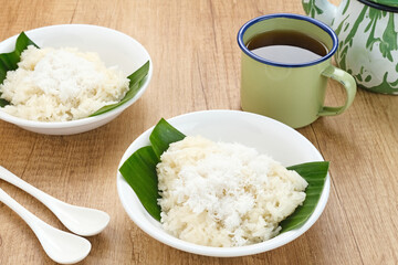 Ketan Kelapa Parut, Indonesian traditional snack, made from steamed glutinous rice and served with grated coconut
