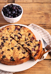 cake with berries and crumble topping