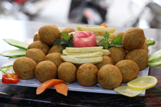 Crunchy Fried Kubba Dish  Meatballs Stuffed with Cracked Wheat Photos