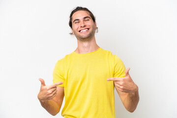 Caucasian handsome man isolated on white background proud and self-satisfied