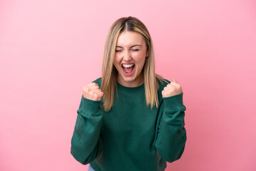 Young caucasian woman isolated on pink background frustrated by a bad situation