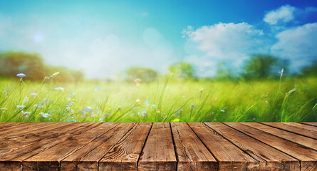 old wooden table and natural landscape background - 561228671