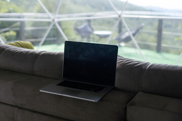 laptop in the dome camping