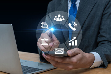 business man using mobile smart phone with business finance icon diagram on desk, internet data technology, digital marketing business, strategy, business finance management, social network concept