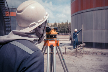 Male worker inspection    survey  level tank