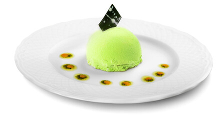 Close-up of tasty green ice cream in white plate isolated on white background