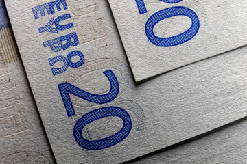 An up-close shot of the raised print on a Euro banknote, emphasizing the advanced tamper-proof...