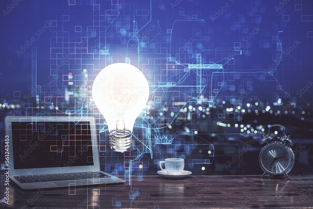 Poster Computer on desktop in office with bulb icon hologram. Multi exposure. Concept of idea.