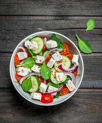 Vegetable salad. Salad with vegetables, cheese and olive oil.