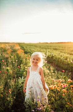 blond girl smiling in wildflower field in Northwest Indiana