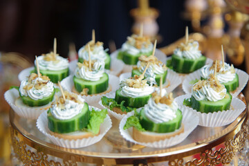 Canapas with cucumber yogurt. Festive snack.