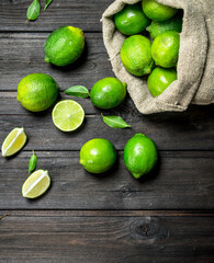 Fresh lime in the sack and pieces of juicy lime.