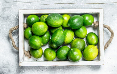 Fresh juicy lime on a tray.