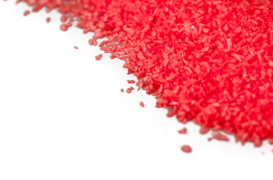 Close-up photo of pink candies isolated on white background