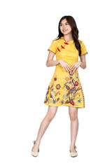 A beautiful asian woman doing a pose while wearing simple yellow chinese dress