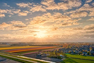 Foto op Canvas Cloudscape and sunset above the village of 't Zand in The Netherlands. © Alex de Haas