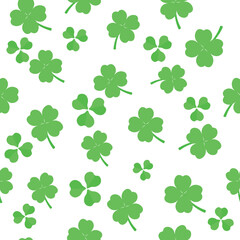 Fototapeta premium Many clover leaves on white background. Pattern for St. Patrick's Day