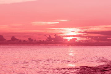 Magenta sunset,sea background,sun sets in the ocean landscape,background from the beach