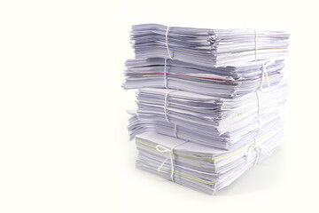 Pile or heap of financial business document paperwork stack on office desk concept of workload overtime or workplace paperless copy