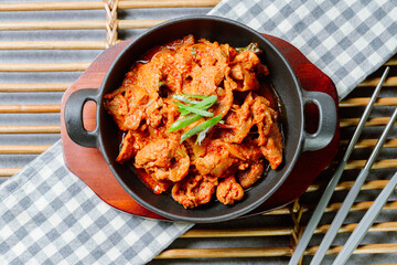 jeyukbokkeum, Korean style stir-fried pork : Thinly sliced pork marinated in spicy ginger-gochujang and stir-fried with onion, carrots, perilla leaves, or abbage. Ingredients vary according to taste.