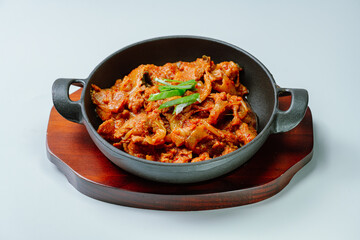 jeyukbokkeum, Korean style stir-fried pork : Thinly sliced pork marinated in spicy ginger-gochujang and stir-fried with onion, carrots, perilla leaves, or abbage. Ingredients vary according to taste.