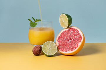 Immune boosting ingredients, fruits for supply of organism with antioxidants. Healthy eating, fresh food, balancing orange juice, grapefruit, lime, mint, lychee. Trendy, modern. 