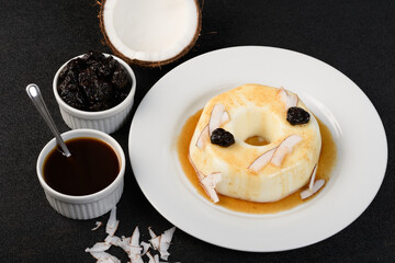 coconut blancmange with prune syrup
