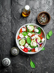 Vegetable salad. Salad with vegetables, cheese and olive oil.