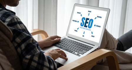 SEO search engine optimization for modish e-commerce and online retail business showing on computer...