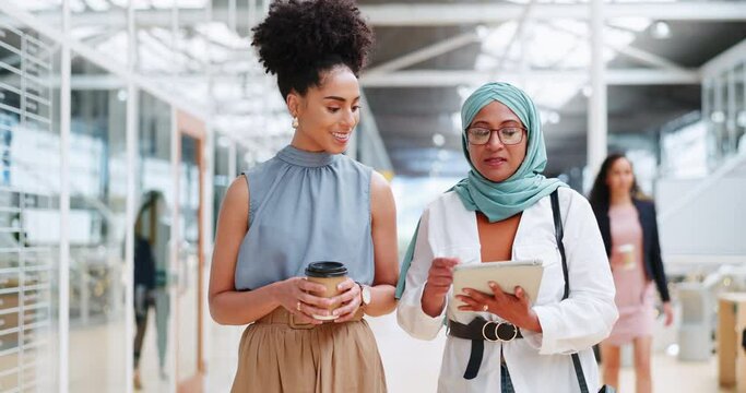 Tablet, communication and diversity team walking, talk and feedback review of company savings budget. Collaboration, retail shopping mall or teamwork partnership of black woman and Islamic Muslim ceo