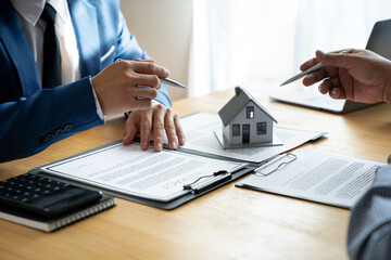 Architect construction, Asian business people meeting planning work on the structure in a team with partners to discuss design projects business and finance agreement.