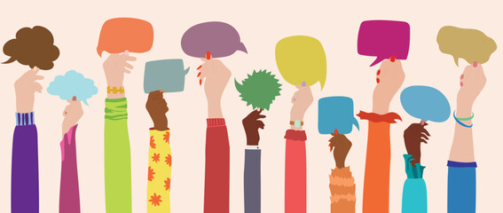 The group of multi-ethnic multicultural women holds a speech bubble in hand as they raise their arms to symbolize diversity.