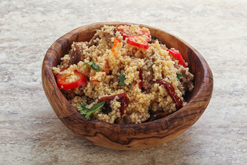 Arabic cous cous with meat and tomato