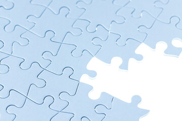 White jigsaw background with copy space for business solutions and success concept