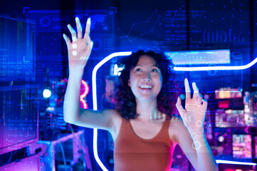 An Asian woman is touching interface on virtual reality screen , Technology futuristic concept .