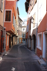 A characteristic small French street in summer.