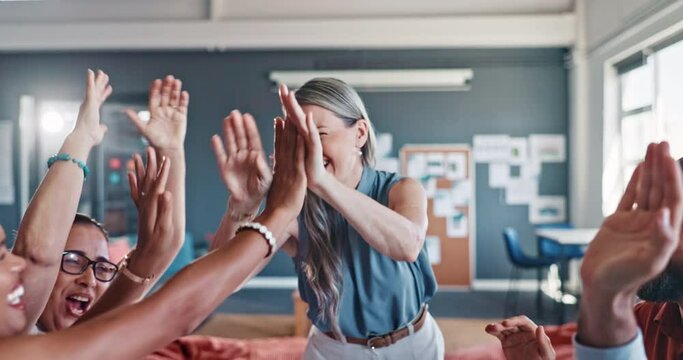 High five, business team and celebration of a marketing worker group with success and motivation. Office, diversity and celebrating people happy about goal, leadership vision and team building deal