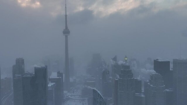 Aerial cinematic downtown Toronto Corktown snow storm 10