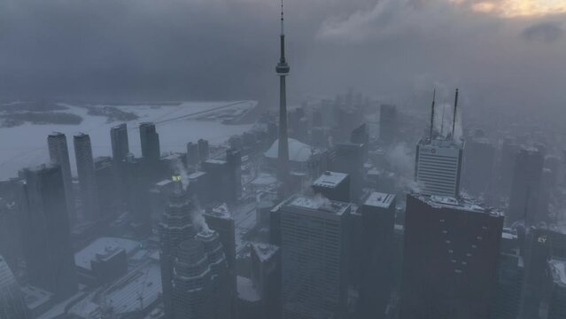 Aerial cinematic downtown Toronto Corktown snow storm 18