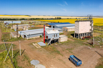 Volga region, Orenburg oblast, grain elevator and mechanized threshing floor in the Dumino village....