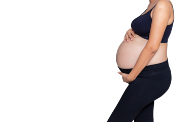 Portrait of a pregnant woman touching her big belly close up, mother, pregnancy, people and expectation. Woman holding big pregnant stomach