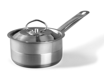 Stack of classic metal kitchen pan on desk